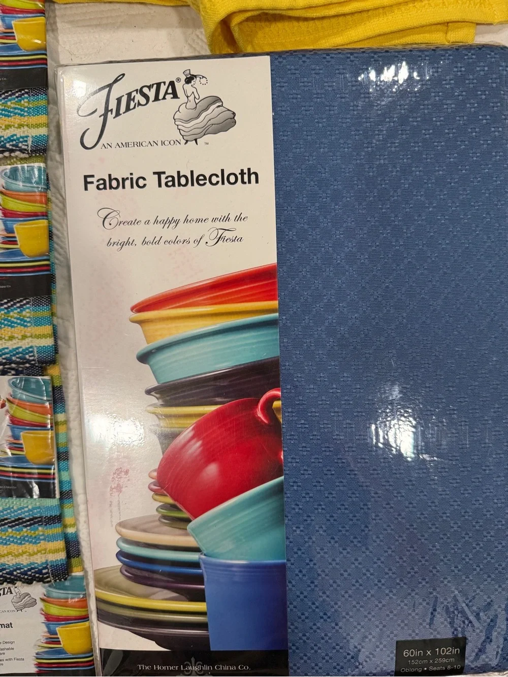 Fiesta 4 Striped Placemats with Yellow towel and Blue Tablecloth